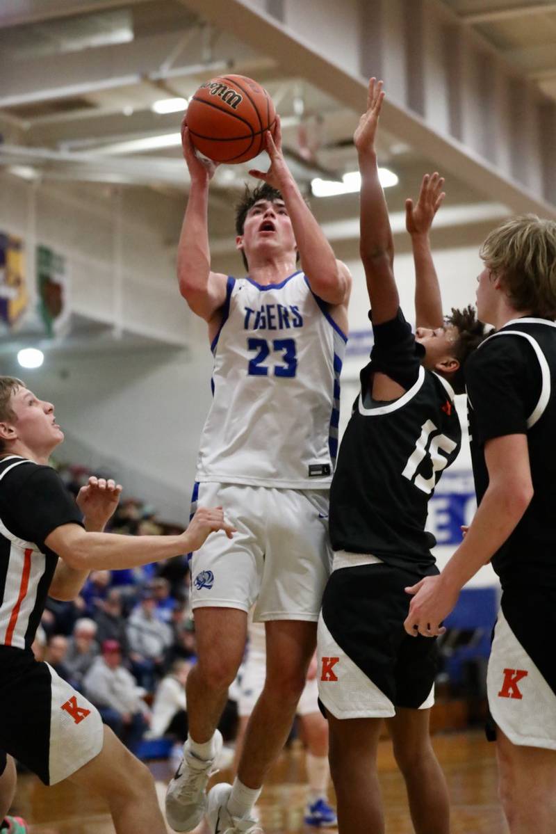 Princeton's Noah LaPorte shoots over Kewanee's Davontae Jordan Tuesday night at Prouty Gym. The Tigers won 66-44.