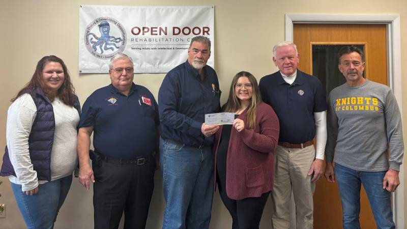 The Knights of Columbus of Somonauk recently presented  a check to Open Door Rehabilitation Center in Sandwich. Pictured from left are Beka Hoelker, Open Door HR & Marketing assistant; Charlie Songreth, KOC District Deputy; Jeff Weseman, KOC Grand Knight; Kayla Suarez, Open Door director of HR & Marketing; Bill Ullrich, KOC Tootise Roll Drive chairman; Fred Marchese, KOC Financial Secretary.
