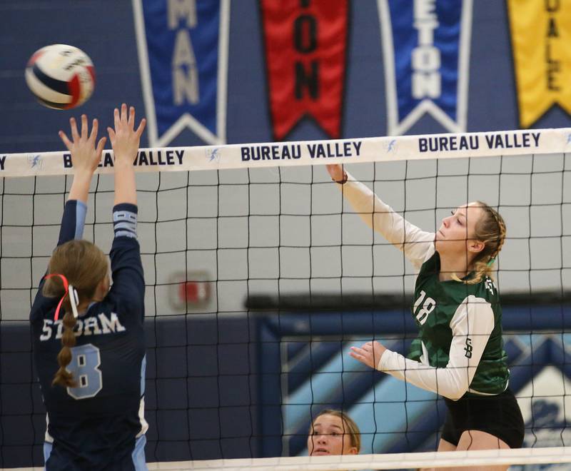 St. Bede's Ashlyn Ehm spikes the ball past Bureau Valley's Taylor Neuhalfen on Tuesday, Sept. 5, 2023 at Bureau Valley High School.