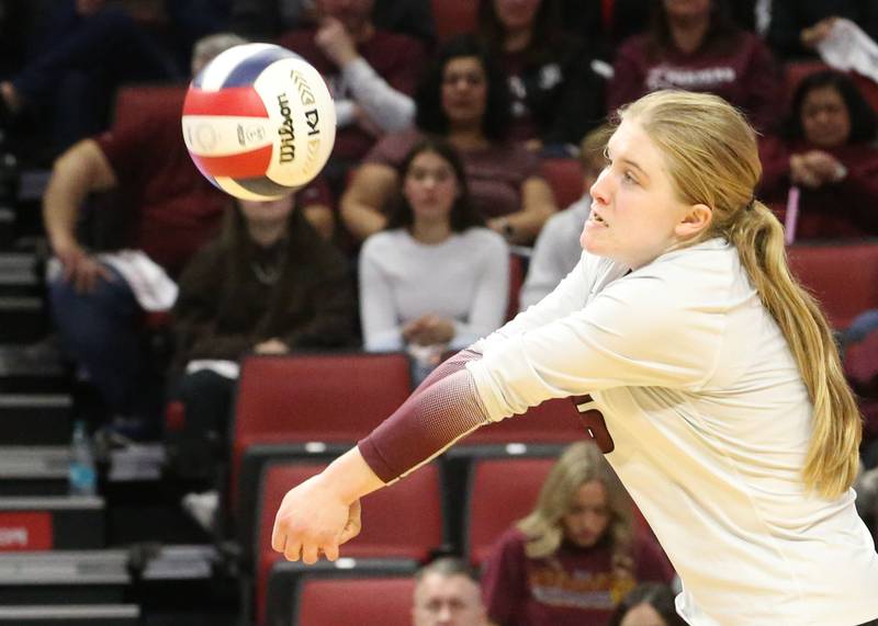 Lockport's Quinn Higham returns a serve from Marist during the Class 4A State semifinal game on Friday, Nov. 15, 2024 at CEFCU Arena in Normal.