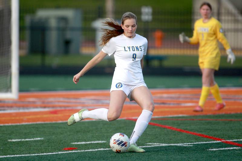 Lyons Township's Claire Mortonson kicks the ball during a game against Naperville North on Wednesday, April 16, 2025 in Naperville.