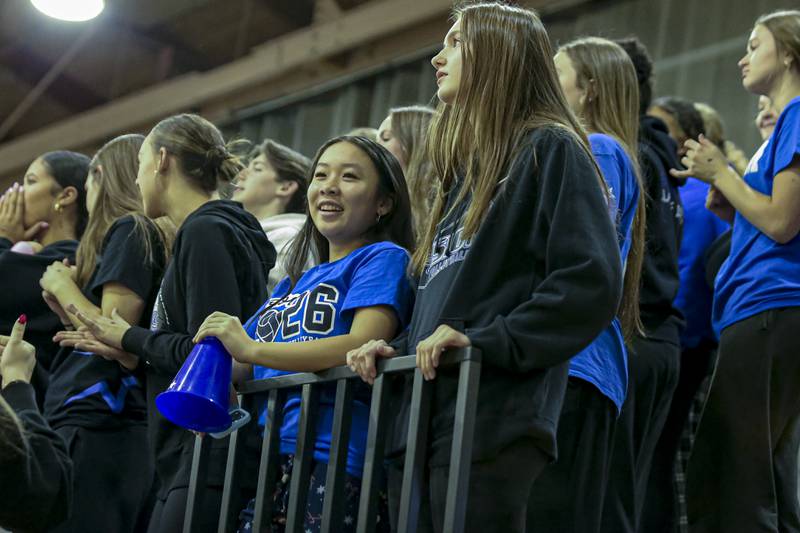 The St Charles North student section cheers during Class 4A Glenbard West Sectional final volleyball match between St Charles North at Benet. Nov 6, 2025 in Glen Ellyn.