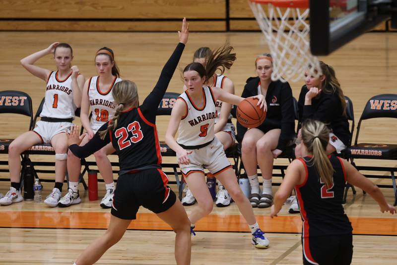 Lincoln-Way West’s Ava Gugliuzza looks to make a play against Lincoln-Way Central on Tuesday, February 7th..