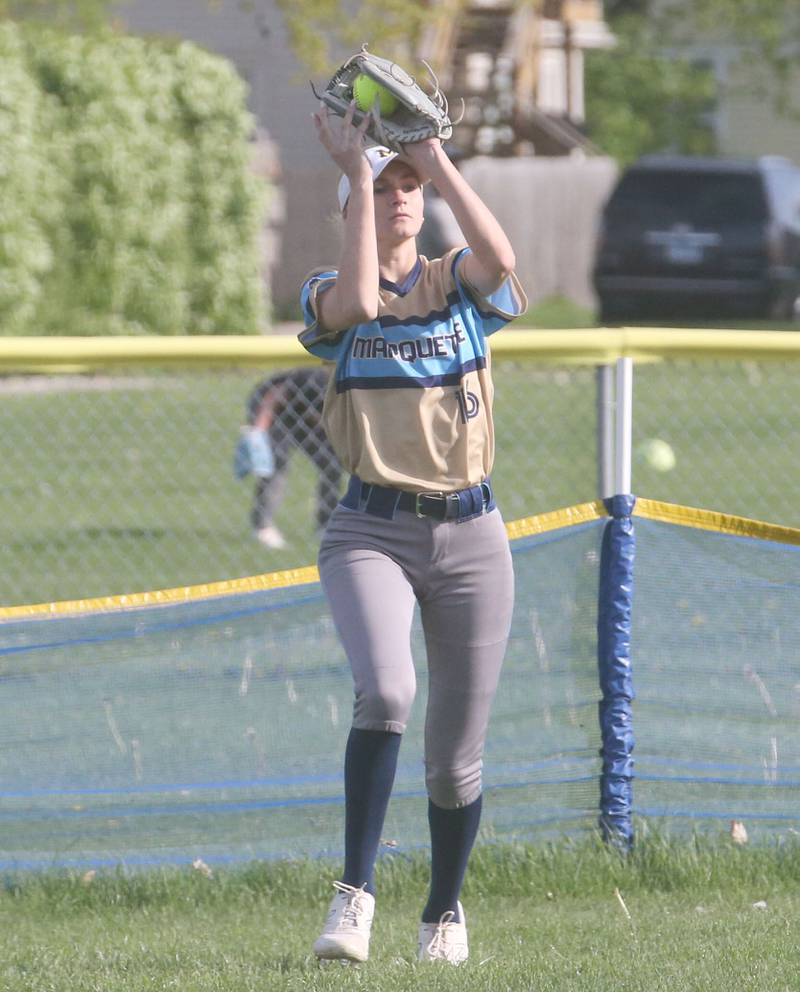 Marquette's Avery Durdan squeezes her glove to make an out against Putnam County on Tuesday, April 29, 2025 in Ottawa.