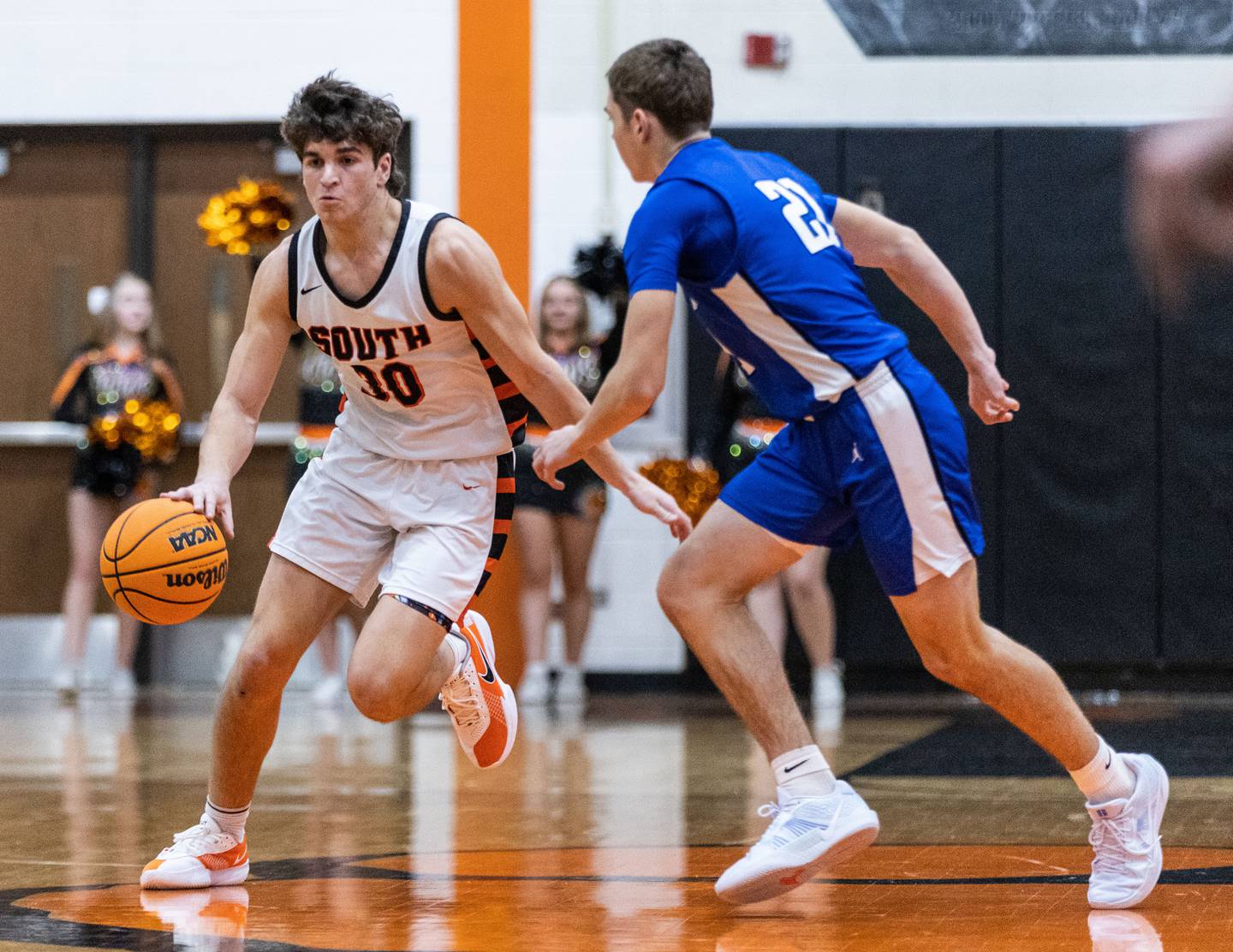 Wheaton Warrenville South’s Luca Carbonaro brings the ball up court during a home game against Geneva High School on Tuesday, Dec. 3, 2024.
