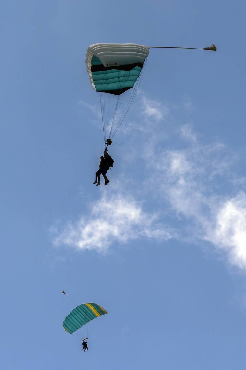 Jumpers for the Valor Support Project glide to the ground Friday, June 27, 2025.
