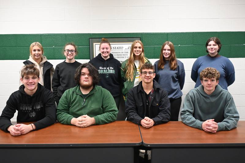 The Illinois Student Assistance Commission has announced 12 seniors from Coal City High School are among the top academic performing students in the state and have been selected for recognition as Illinois State Scholars. The honored students [from left, seated] are: Jim Feeney, Dominic Cimino, Kevin McConnell and Ryland Megyeri. Standing are Ava Houston, Amelia Fritz, Alaina Gill, Abby Stiles, Kylie Jackson and Kylee Scheer.