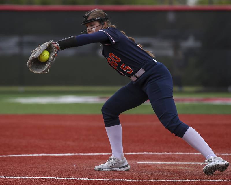 Oswego's Adalynn Fugitt (5) stabs a come backer to the pitcher's circle during softball game between Oswego at Yorkville. May 5, 2026 in Yorkville.