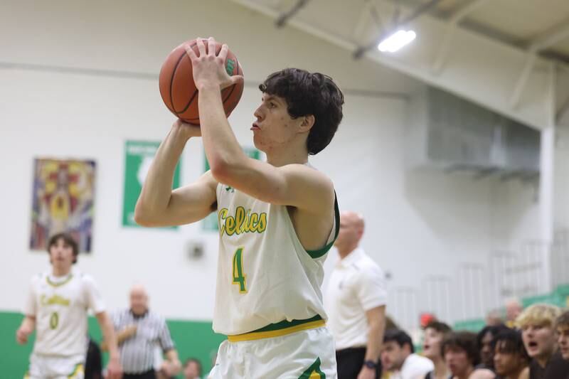 Providence’s Zach Ford puts up the corner three point shot against Joliet Catholic on Saturday, Dec. 9th, 2023 in New Lenox.