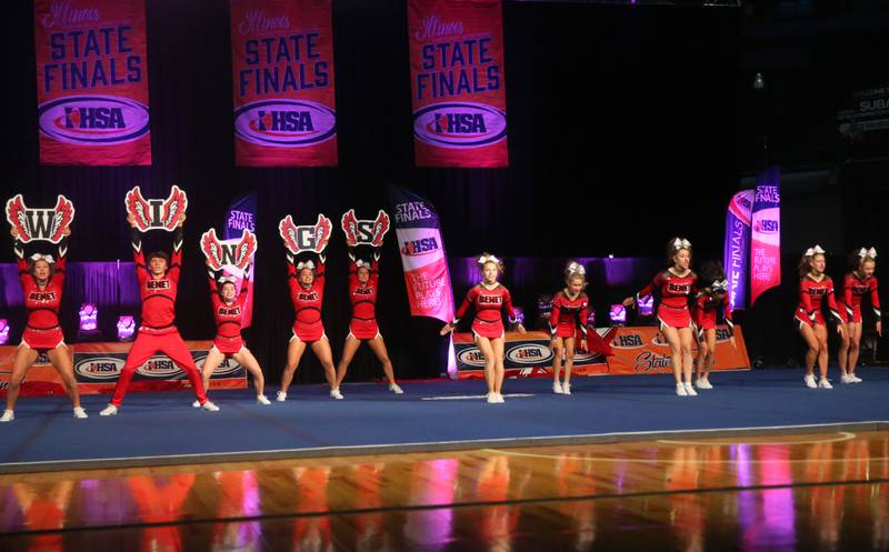 Members of the Benet Academy cheerleading team perform at the Competitive Cheerleading State Final Competition on Saturday, Feb. 3, 2024 at Grossinger Motors Arena in Bloomington.