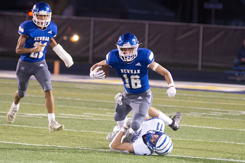 Newman’s Ayden Batten is pulled down after picking up yards on the opening kick Friday, Sept. 30, 2022 against Princeton.