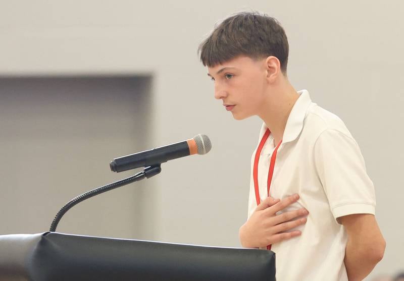 Parkside Middle School student Monty Moats, leads the Pledge of Allegiance during the Veterans Day program on Tuesday, Nov. 11, 2025 in Peru.