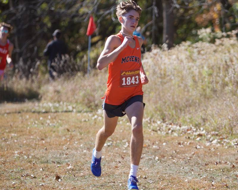 McHenry's Nate Martin  heads for the finish line at the Fox Valley Conference meet on Saturday, Oct. 19,2024 at Hickory Nut Grove Preserve in Cary.