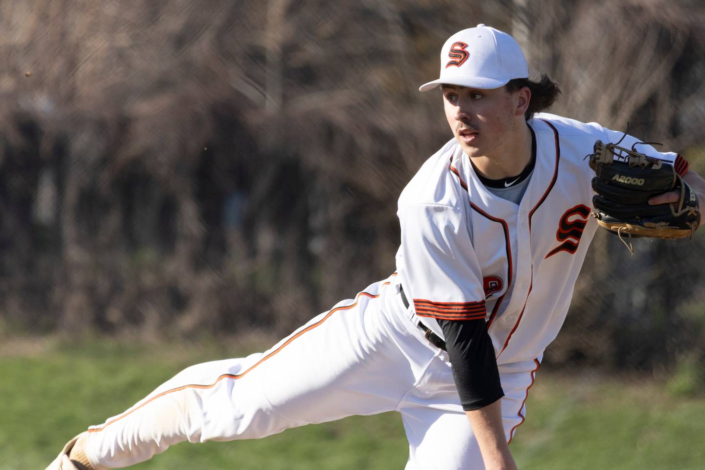 Sandwich's Braden Behringer delivers a pitch during Wednesday's game with Plano in Sandwich.