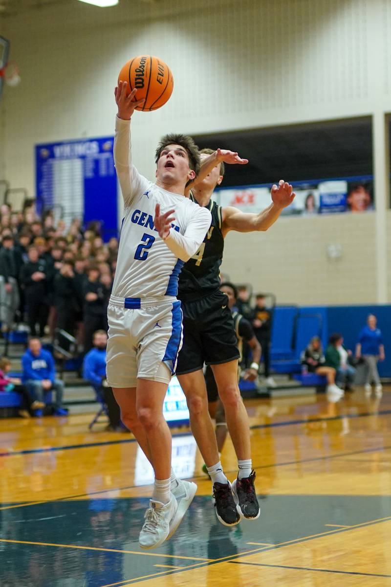 Geneva’s Gabe Jensen (2) drives to the basket against Glenbard North's Jack Schager (14) during a class 4A Geneva Regional final basketball game at Geneva High School on Friday, Feb. 28, 2025.
