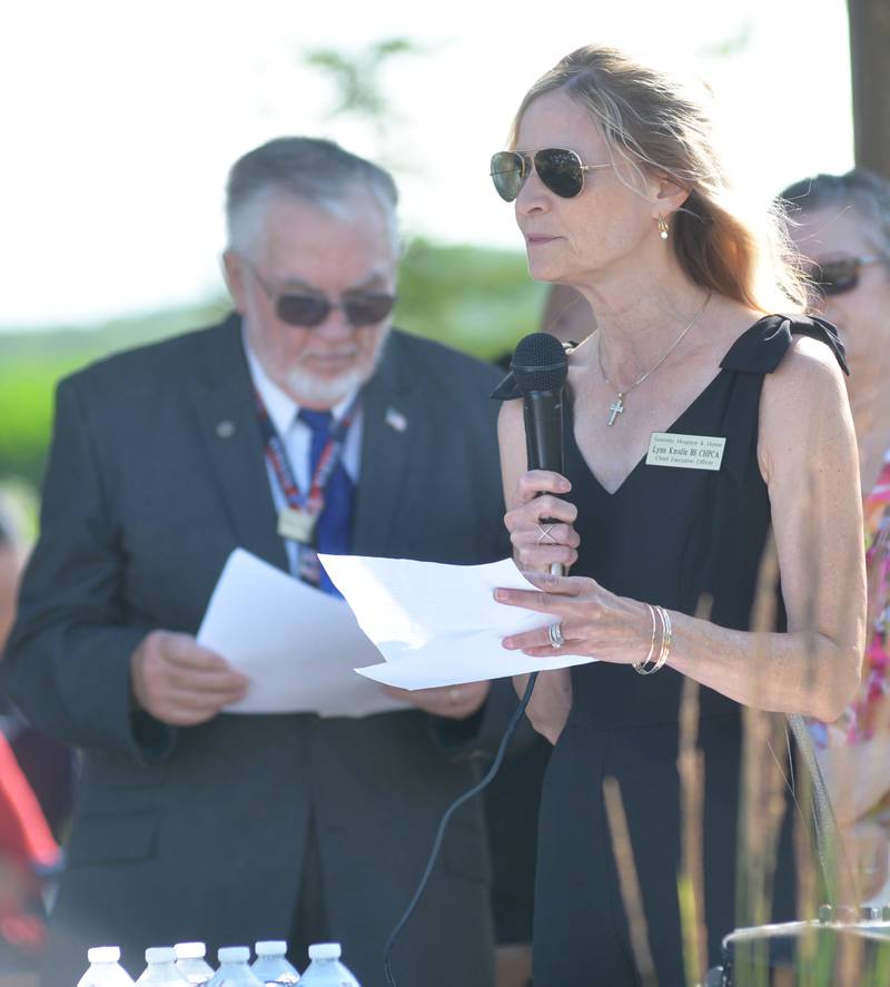 Serenity Hospice & Home Executive Director Lynn Knodle speaks at the memorial butterfly release on Saturday, July 8, 2023, in Oregon.