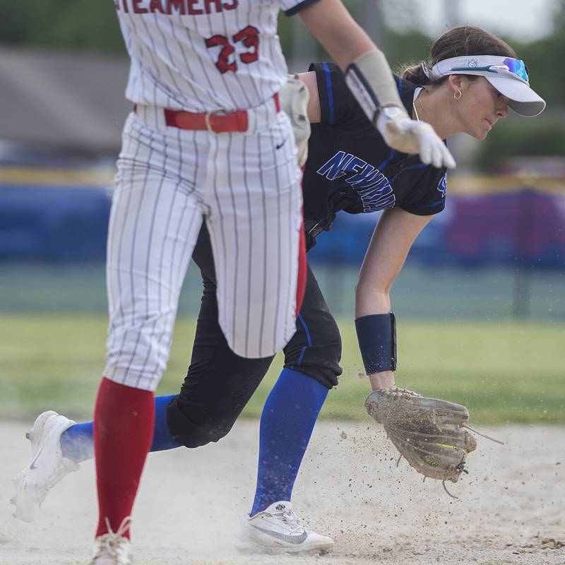 Newman’s Lucy Oetting scoops a grounder against Fulton Tuesday, May 19, 2026, at the Class 1A softball regionals at Newman.