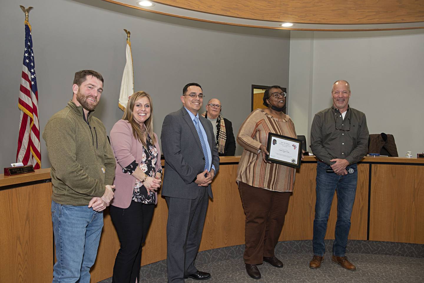 Dixon's City Council, from left, Chris Bishop, Mary Oros, Mayor Li Arellano, Dennis Considine and Mike Venier celebrate the achievements of Linda LeBlanc-Parks, who was given the Ike Mercer award. LeBlanc-Parks holds a masters degree in special education and serves with the Diversity Committee of the Sauk Valley, the Sauk Valley Food Bank and the YWCA. Her nephew Bennie Boyd, a previous recipient of the award, appeared via video to offer congratulations.