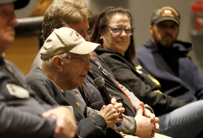 U.S. Marine World War II veteran John Rickerd talks about Iwo Jima during the Veterans Day event on Monday, Nov.11, 2023, at the Upper Campus of McHenry High School.