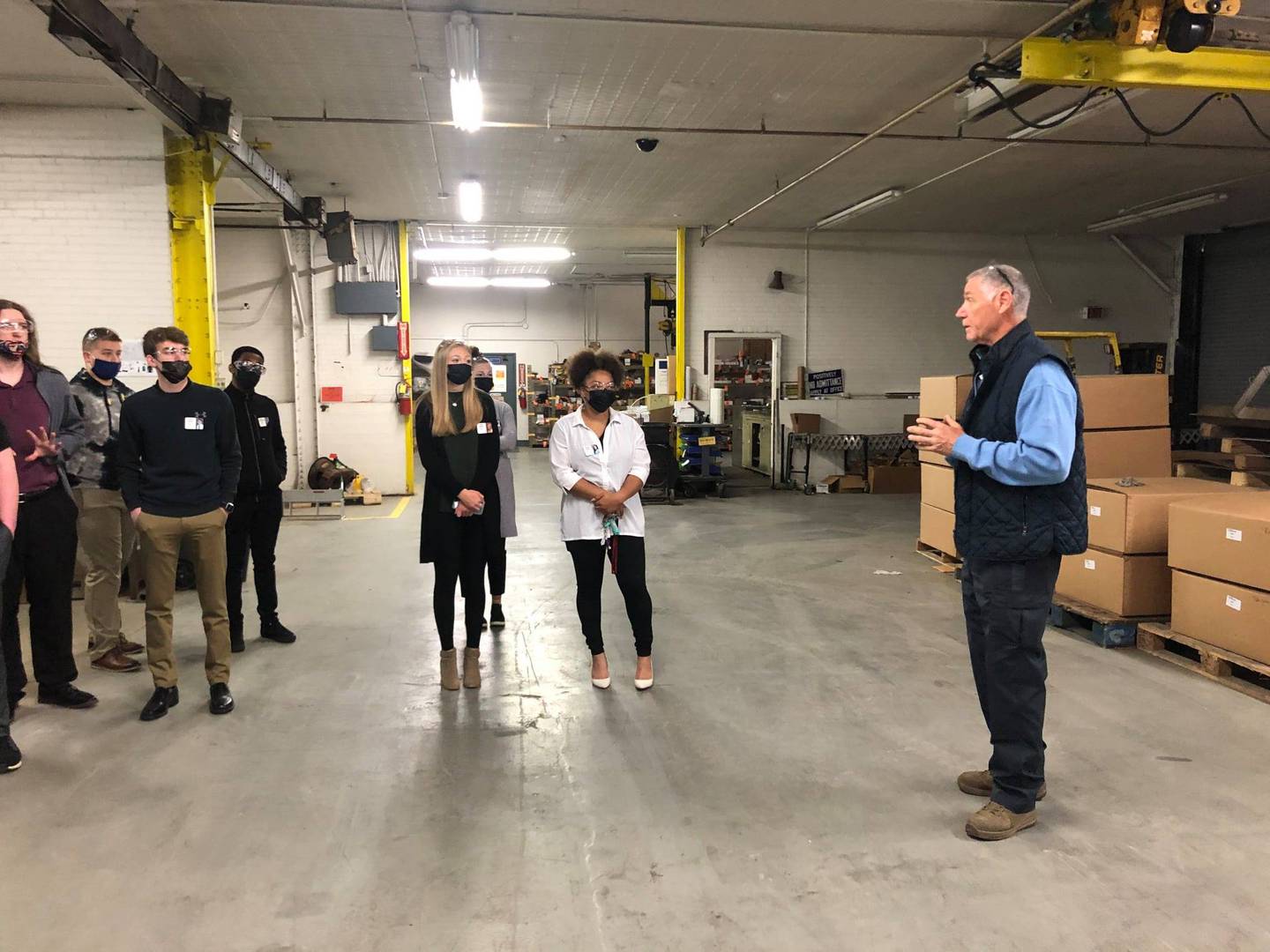 Streator Area CEO students listen to Mike Supergan, president of Teleweld, Inc and Flink Company, during a visit to the Streator industry.