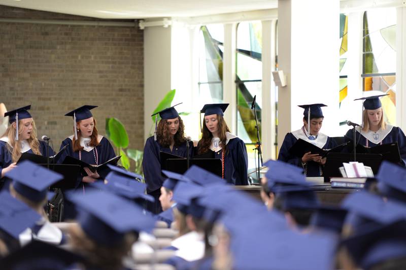 Nazareth's  class of 2022  choir sings during their mass prior to their graduation Sunday May 22, 2022.