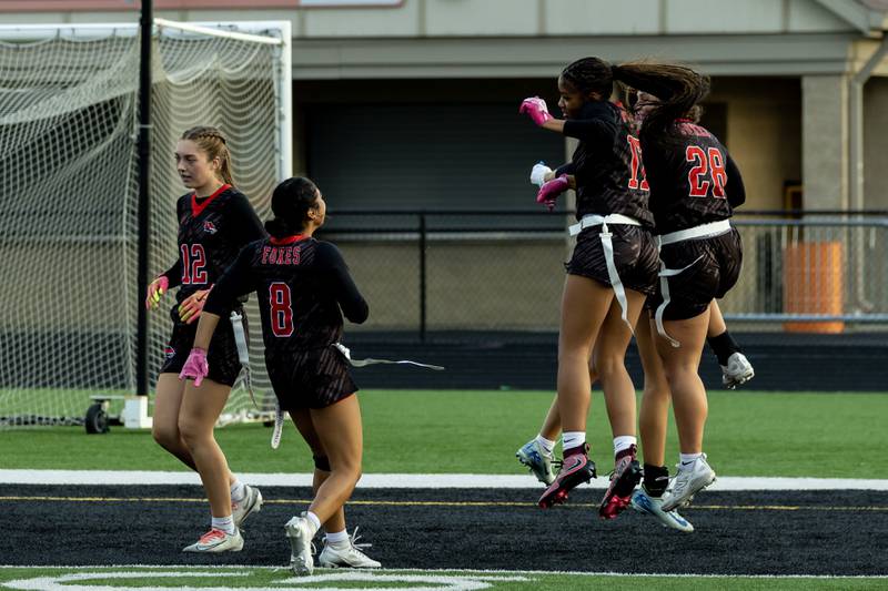 Yorkville celebrates after scoring a touchdown during the IHSA Danville Sectional varsity flag football game against Plainfield Central at Plainfield East on Oct. 13, 2025.