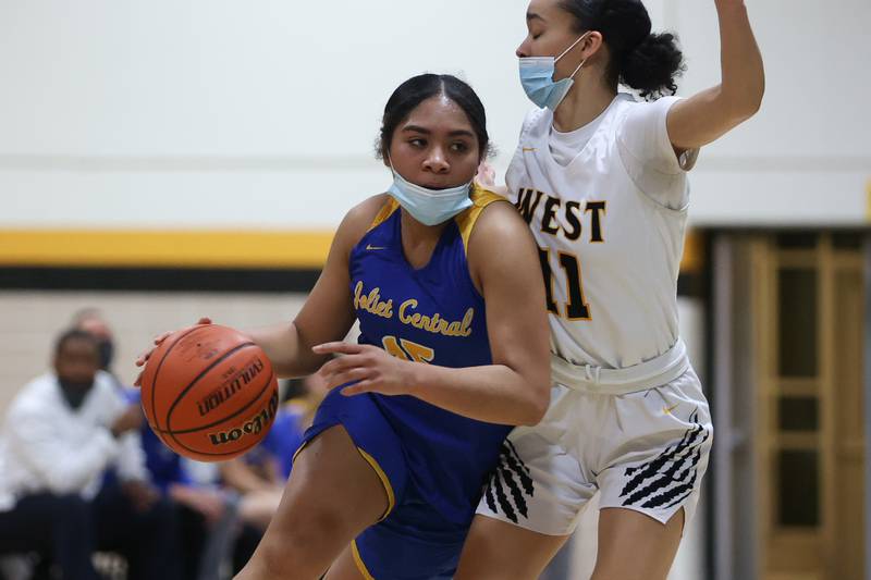 Joliet Central’s Lovely Tua-Link drives to the basket against Joliet West in the Class 4A Moline Regional semifinal. Tuesday, Feb. 15, 2022, in Joliet.