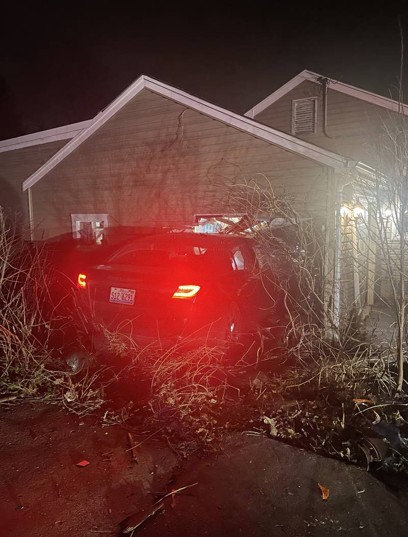 A vehicle crashed into the Crystal Lake home of Danielle Irwin on Monday, March 20, 2023, causing damage to her garage, car and belongings.