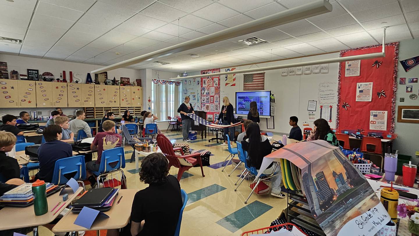 Morris Grade School eighth-grade teacher Amy Lindenborn teaches the U.S. flag code as part of her history, social studies and civics course. 2025