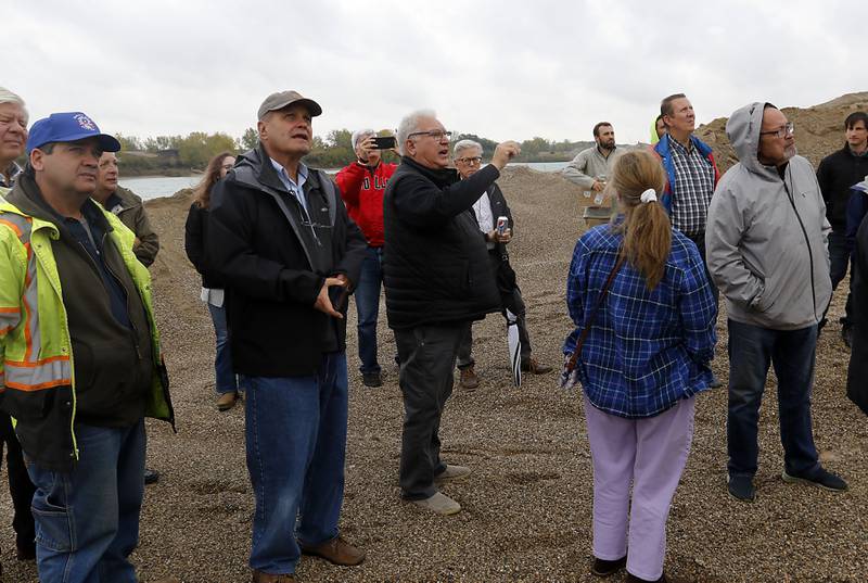 Jack Pease explains the Super Aggregates Marengo Lakes mine during the McHenry County Sand and Gravel Mining Tour on Thursday, Oct. 12, 2023. The tour brought McHenry County board members, township and village officials on a four hour trip to visit operating mines on Route 23 in Marengo and to former sites now reclaimed for housing, recreation in Algonquin and Cary.