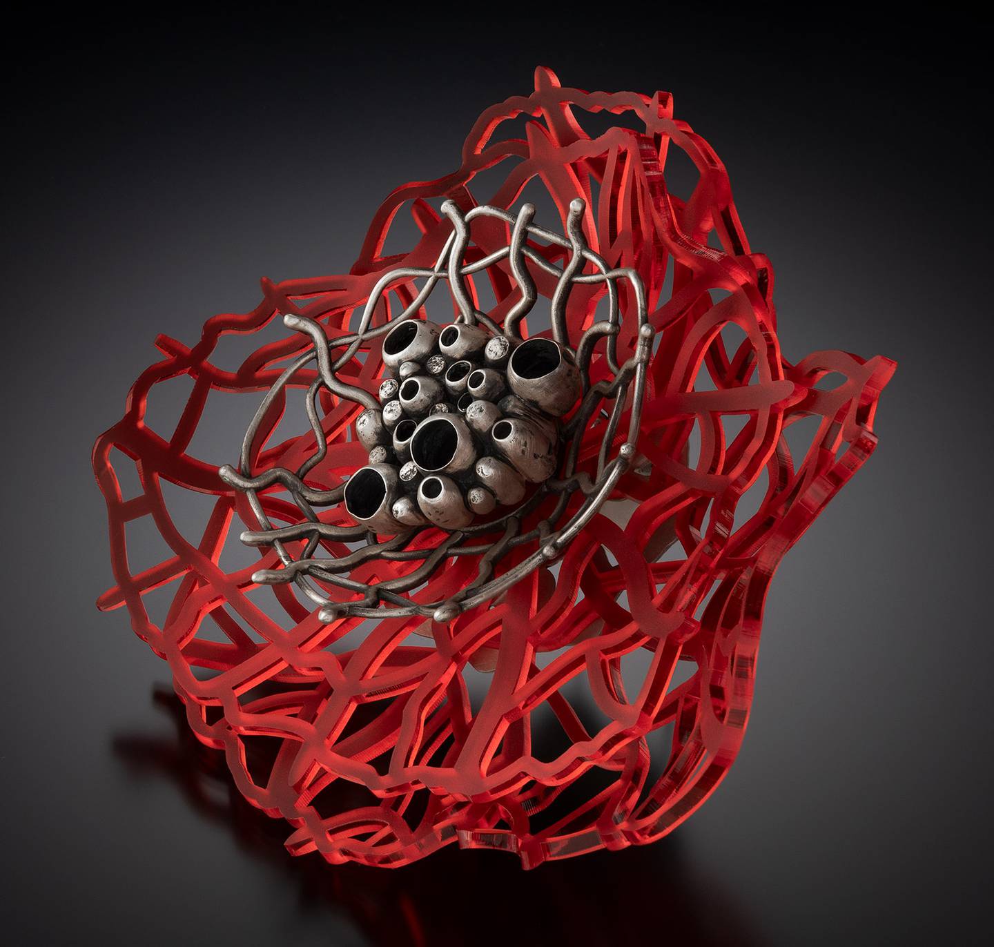 The red flora is part of Lisa Dienst-Thomas' Fantastical Blooms collection.