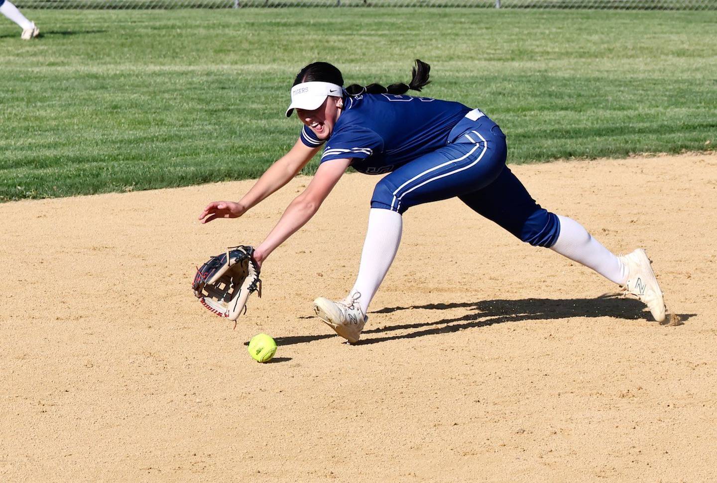 Princeton short stop Keely Lawson lays out for a ground. ball in Friday''s regional semifinals at Prather Field. The Tigresses beat Sandwich 9-6.