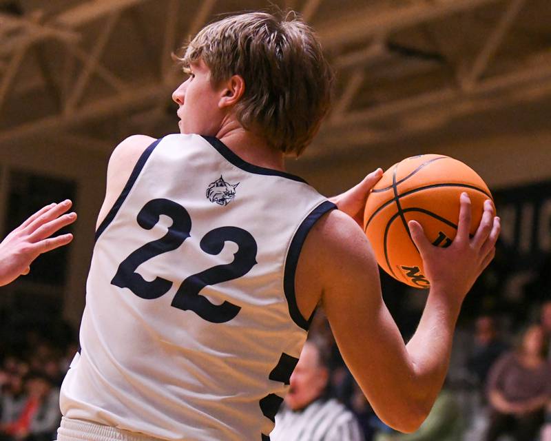 West Chicago's Tommy Doyle (22) looks for an open teammate during the game on Friday Jan. 3. 2025, while taking on Glenbard South held at West Chicago High School.