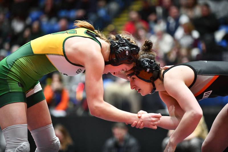 Angelina Gochis of Kaneland, right, and Annalee Aarseth of Crystal Lake South wrestle in the 110-pound championship match in the IHSA Girls Individual State Finals on Saturday, March 1. Gochis took first place over Aarseth.