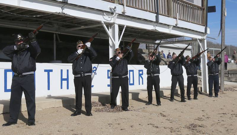 Veterans perform a 21-gun salute during the annual Pearl Harbor parade and memorial service on Saturday in Peru. This year marks the 83rd anniversary of the Dec. 7, 1941, attack on Pearl Harbor.
