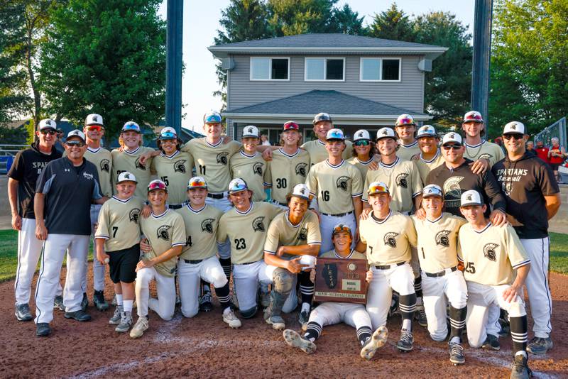 Sycamore players celebrate after defeating Rock Island, 8-0, in an Illinois Class 3A super-sectional, Monday, June 5, 2023, in Geneseo.