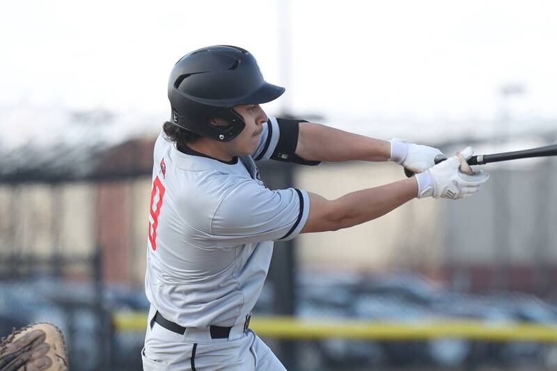 Bolingbrook’s Jonny Carrera connects against Plainfield East on Monday, March 27, 2023.