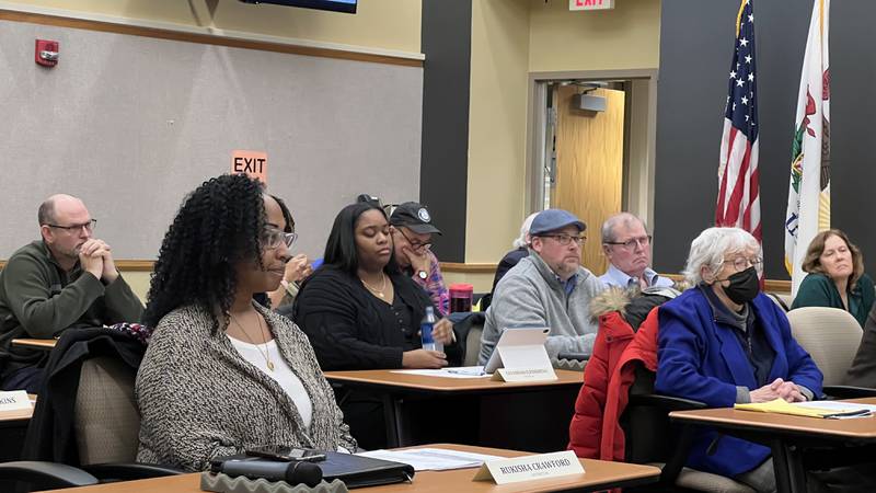 DeKalb County Board members listen during the public comment period Jan. 18, 2023, board meeting. During the meeting the board unanimously approved a statement in opposition of Illinois House Bill 4412, which would limit municipal governments ability to set regulations related to energy production through solar and wind facilities.