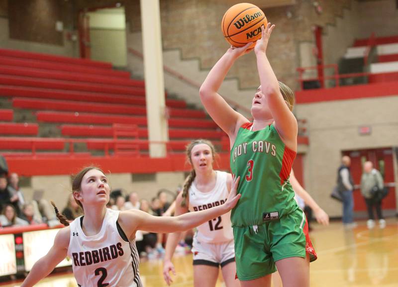 L-P's Emma Jereb looks to shoot a shot as Metamora's Leah Koster defends during the Ottawa Girls Holiday Tournament on Monday, Dec. 16, 2024 in Kingman Gym at Ottawa High School.