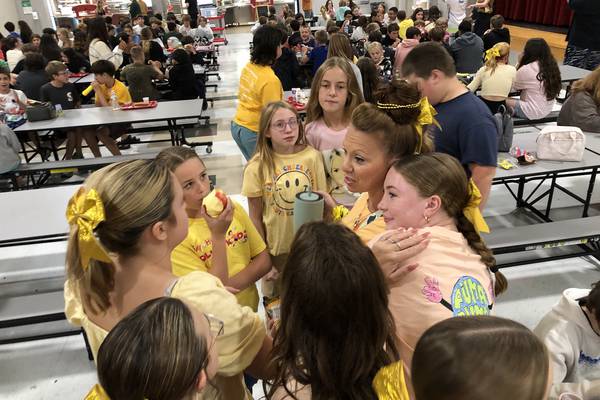 ‘This child is my hero’: Son’s cancer prompts McHenry Middle School staff member to raise awareness 