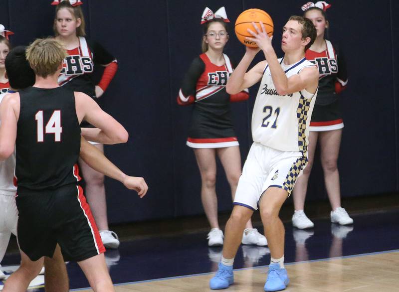 Marquette's Lucas Craig shoots a jump shot against Earlville on Friday, Jan. 3, 2025 in Bader Gym at Marquette High School.
