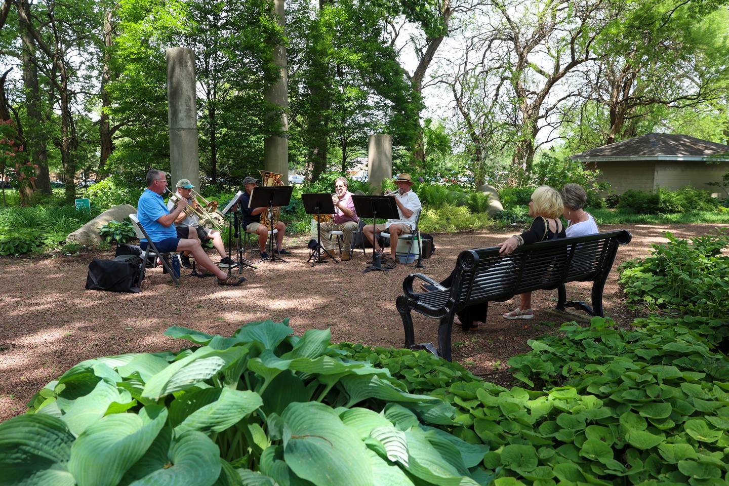 Attendees enjoy live music by the Kankakee Valley Symphony Orchestra Brass Quintet during the 36th annual Rhubarb Festival at the Kankakee County Museum on Sunday, May 17, 2026.