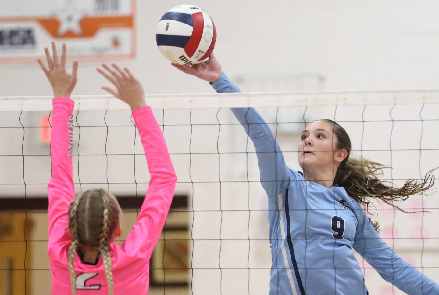 Parkview Christian's Abigail Carlyle hits the ball past Earlville's Jessica Miller during the Class 1A Regional semifinal game on Monday, Oct. 28, 2024 at Serena High School.