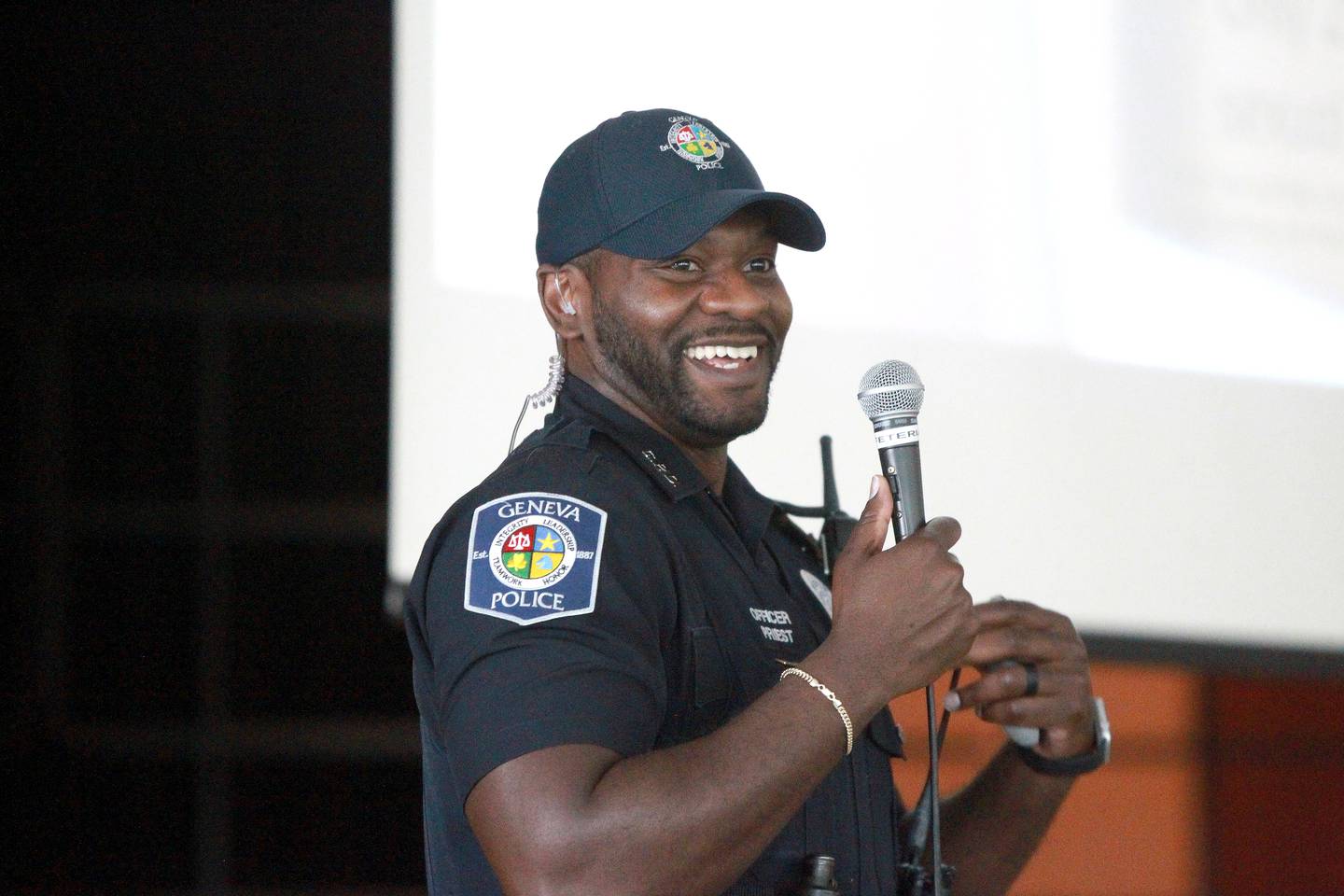 Geneva Police Officer Quantrell Priest gives a presentation about computer safety to sixth-graders at Geneva Middle School North.