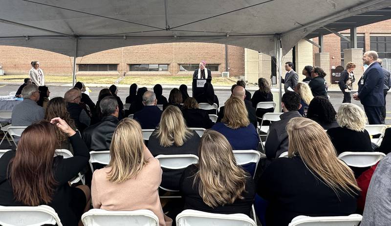 Bishop Louis Tylka of the Catholic Diocese of Peoria speaks to attendees during the blessing of the outpatient entrance on Thursday, Oct. 31, 2024 at OSF HealthCare Saint Elizabeth Medical Center in Peru.