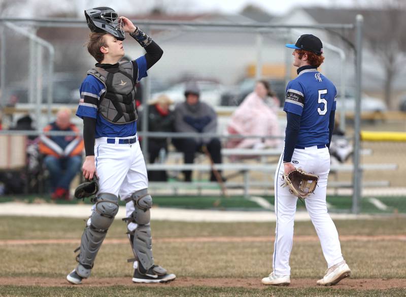 Burlington Central catcher Jake Johnson comes out to talk to pitcher Michael Person during their game against Sycamore Tuesday, March 21, 2023, at Sycamore Community Park.