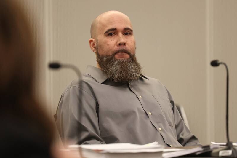 Jermaine Mandley, 47, of Bolingbrook, listens to the prosecution speak at the Will County Courthouse on Thursday, Aug. 17, 2023 in Joliet. Mandley is on trial for the alleged shooting of Maya Smith, 24, in June 2022.