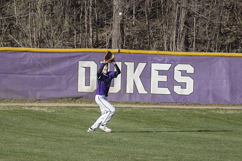Dixon’s James Leslie hauls in a fly ball in centerfield against Winnebago Thursday, April 6, 2023.
