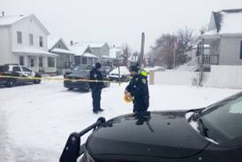 PHOTOS: Police investigate shooting deaths of woman, child in Joliet