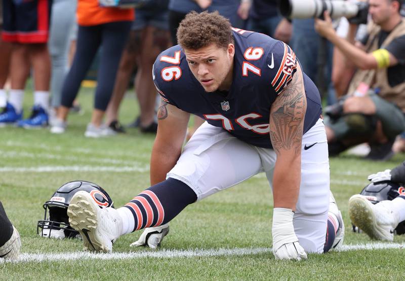 Chicago Bears offensive tackle Teven Jenkins stretches before the Bears take on the Kansas City Chiefs Sunday, Aug. 13, 2022, at Soldier Field in Chicago. The Bears beat the Kansas City Chiefs 19-14.